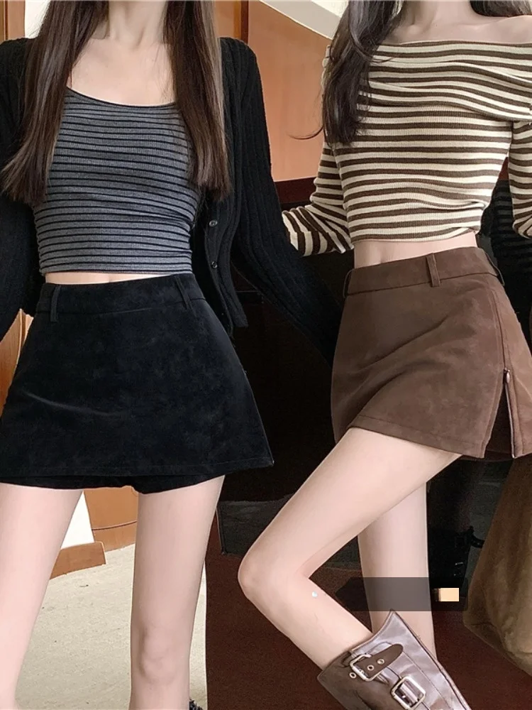 

Юбка трапециевидной формы в стиле ретро для девочек, повседневная юбка из искусственной кожи с высокой талией и разрезом, подходит для молодых женщин, осеннее новое поступление