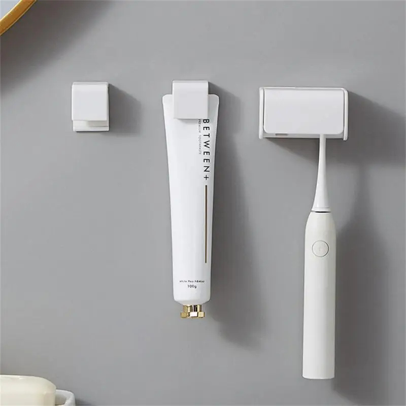 Wall-mounted Toothbrush Holder Punch-free Toothpaste Holder Toothpaste Storage Rack Bathroom Accessories Toothbrush Holder