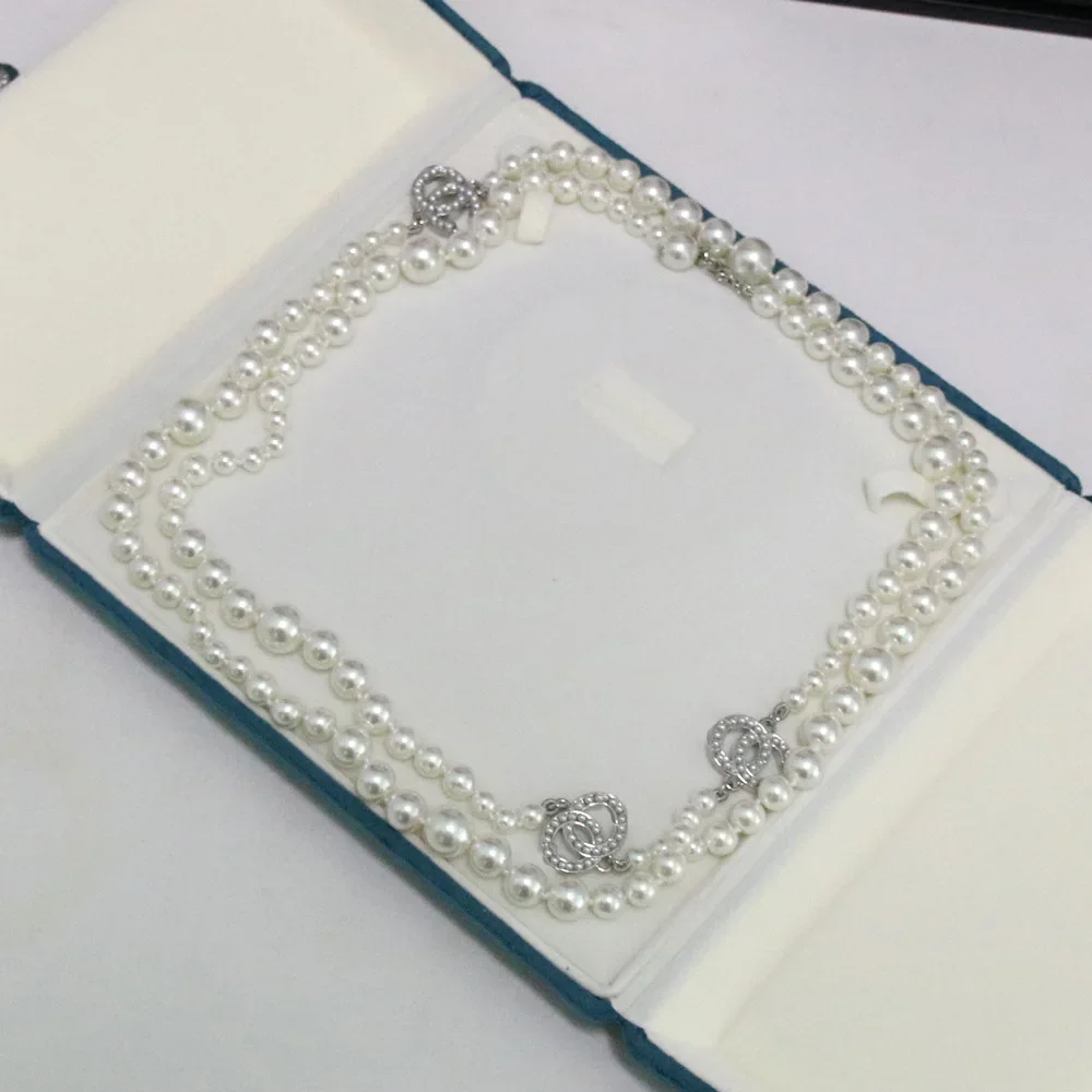

Xiaoxiang High end Heavy Industry Luxury Edition 3 C Silver Pearl Double layer Sweater Chain Jacket Accessories Versatile