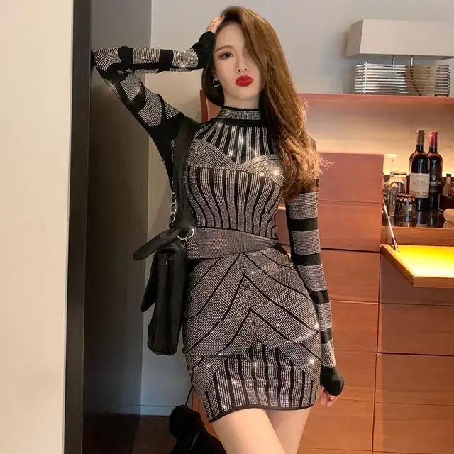 

2023 Autumn Winter New Heavy Rhinestone Embellished Sparkling Long Sleeve Top with High Waist Skirt Fashion Two Piece Set
