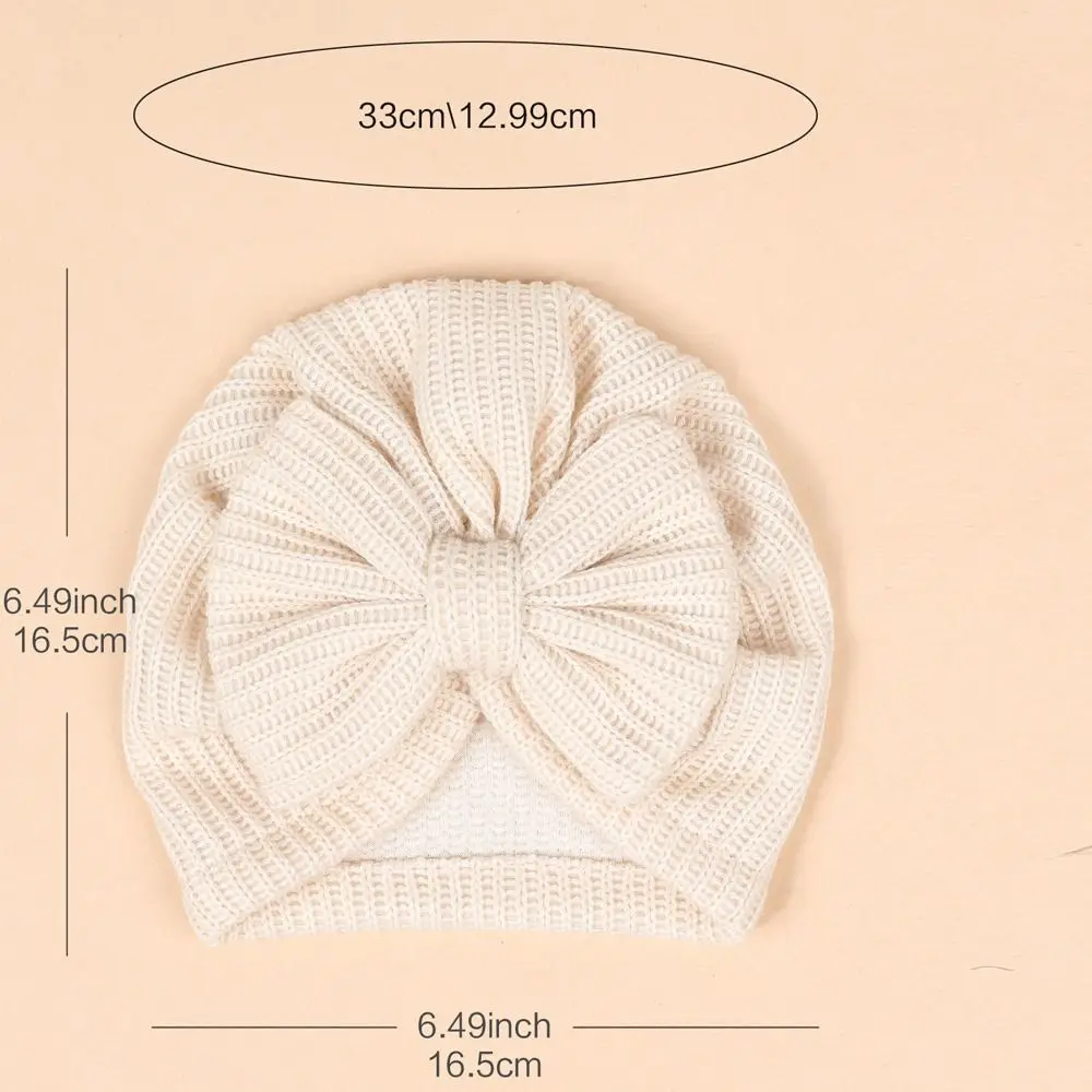 جديد لطيف Bowknot محبوك عمامة بلون دافئ الرضع قبعة قبعة مطاطا البلوز كاب Headerap