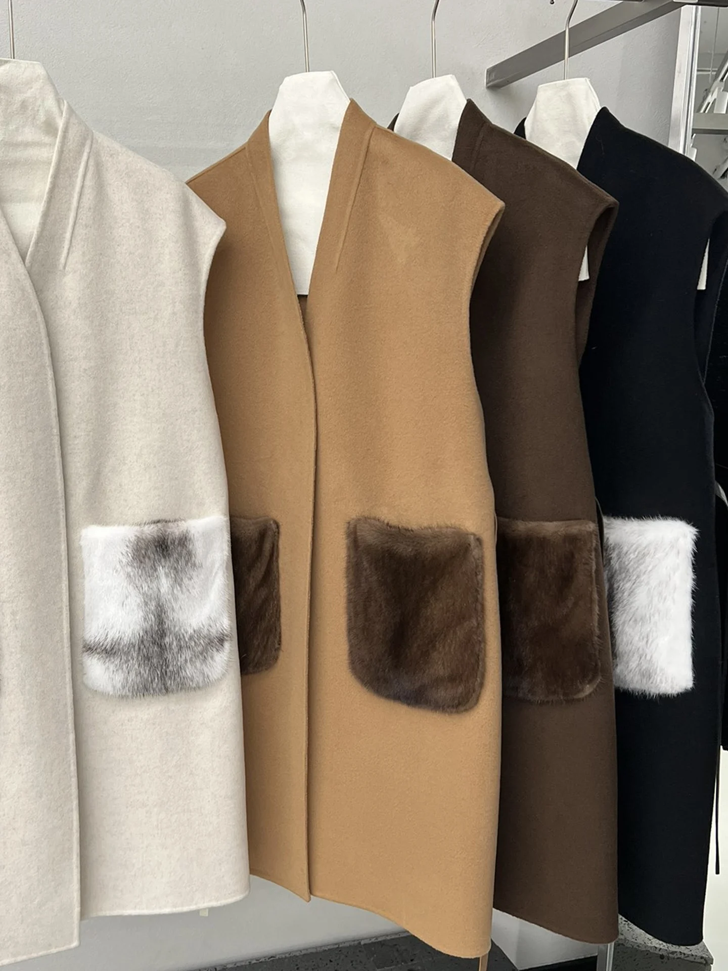 고품질 캐시미어 울 조끼, 중간 길이 밍크 포켓 타이 웨이스트 중간 길이 민소매 양면 울 가디건