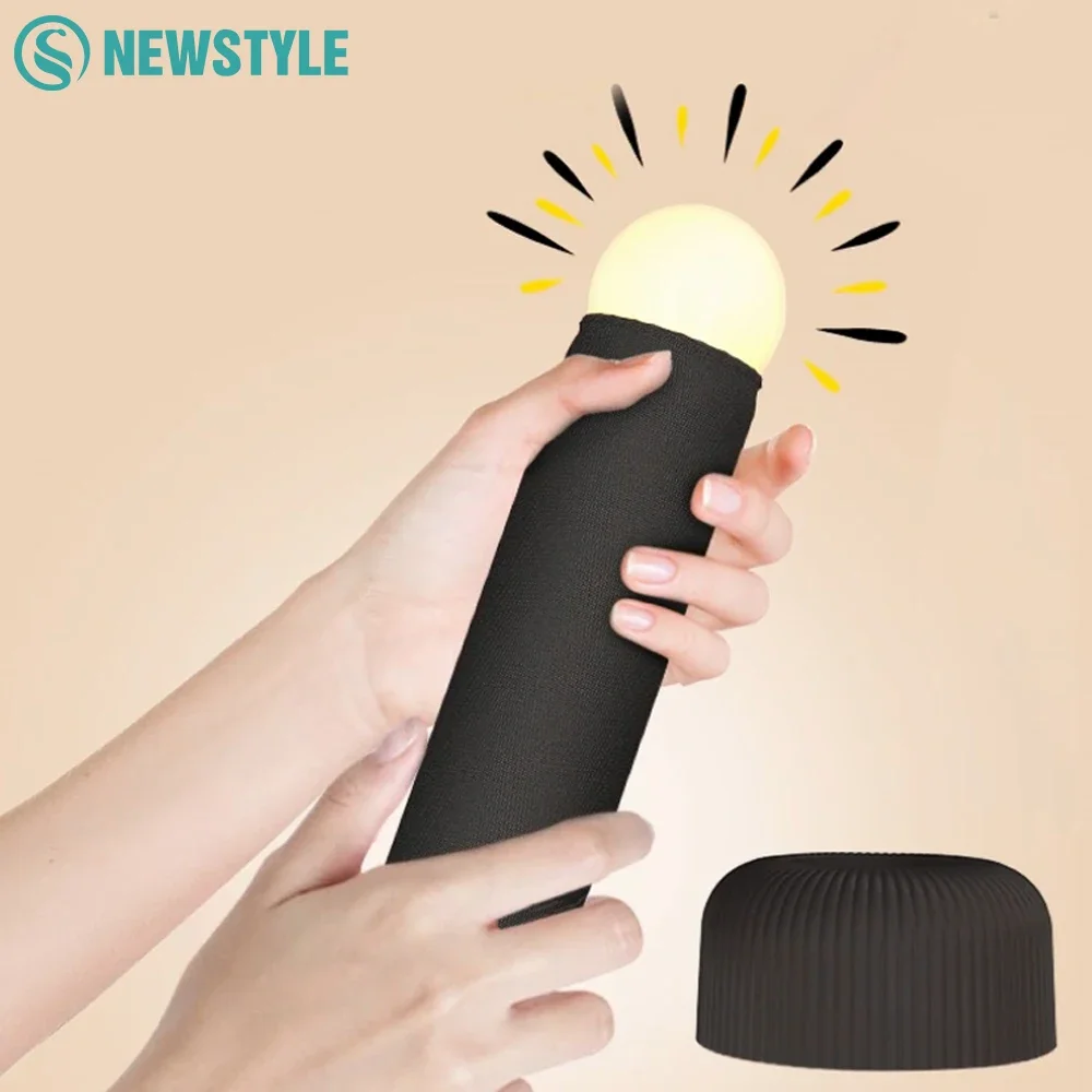 Interest Handheld Night Light Creative LED Sleeping Lamp Original Design Unique switching method Has a Base for Placing on Table