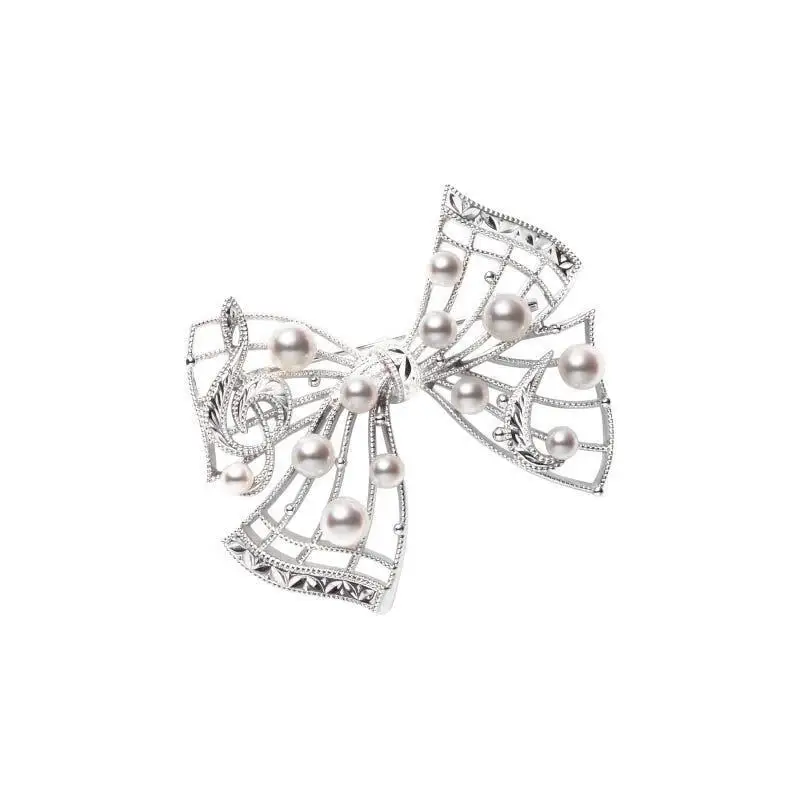 Elegante spilla in metallo dal design retrò