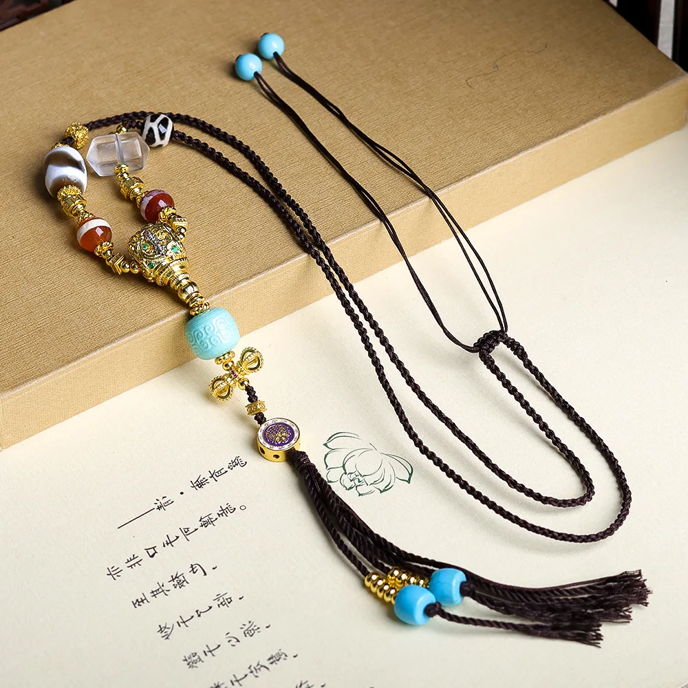

Original design: Hand woven ethnic style necklace, cultural toys, tiger teeth, Tianzhu, magnesite, turquoise sweater chain