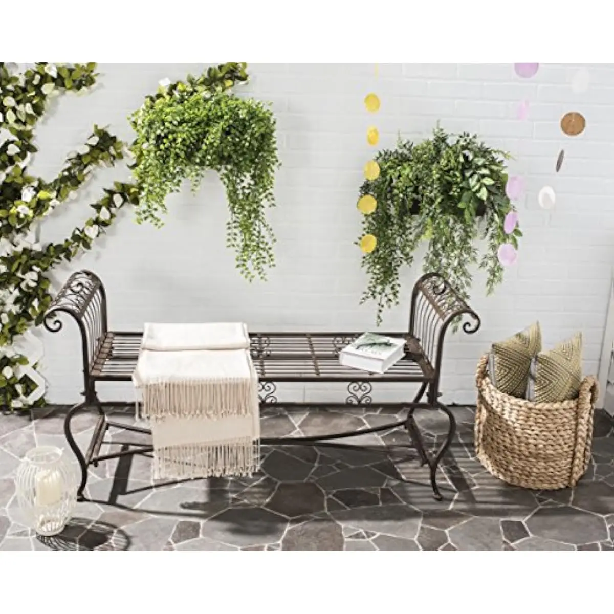 Outdoor iron garden bench with vintage ornate scrollwork silhouette, rustic brown finish, weather-resistant frame, 52 inch width
