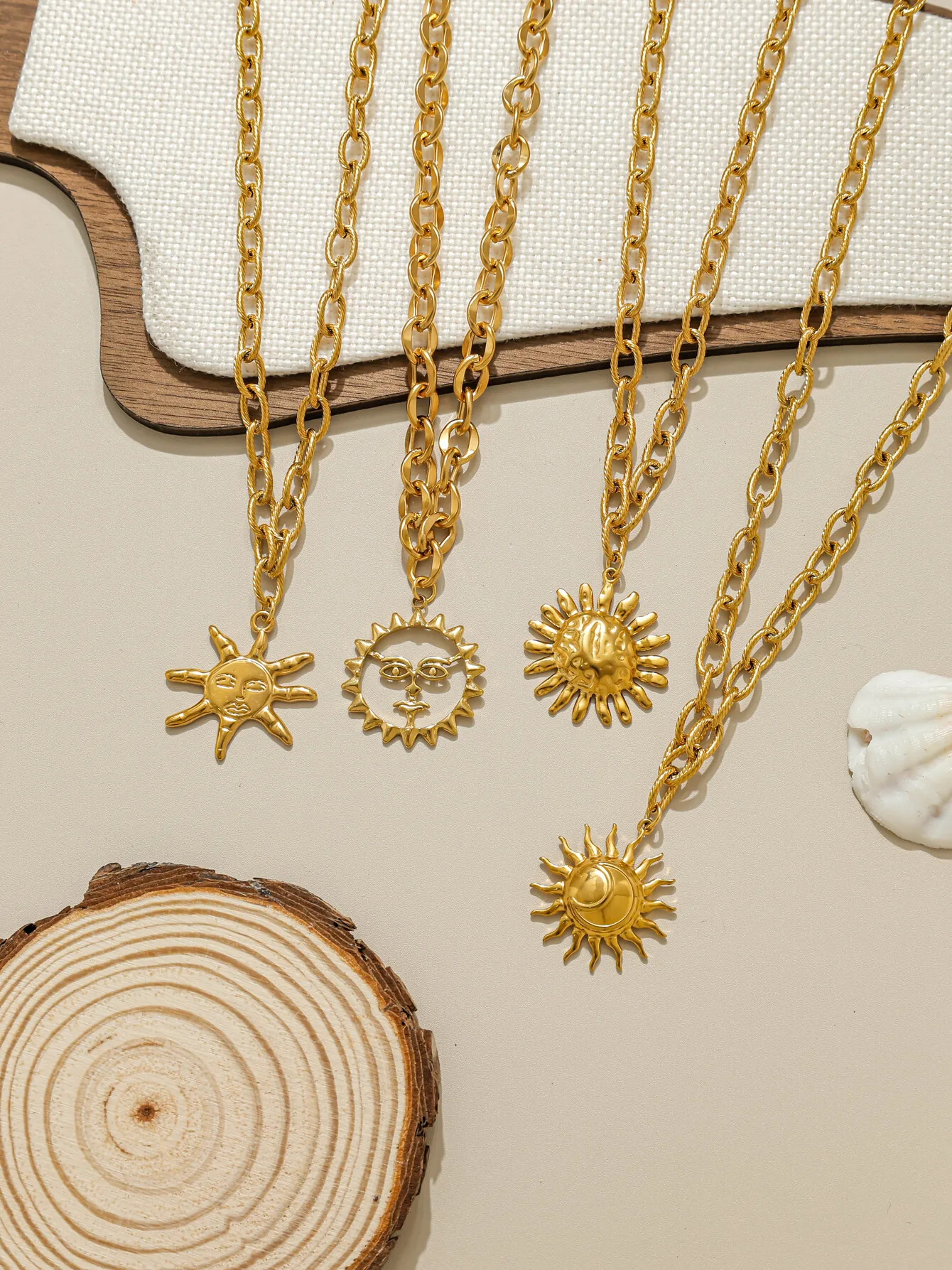 

Women's stainless steel sun pendant necklace, 18K gold plated, stackable, bohemian style, waterproof fashion jewelry.