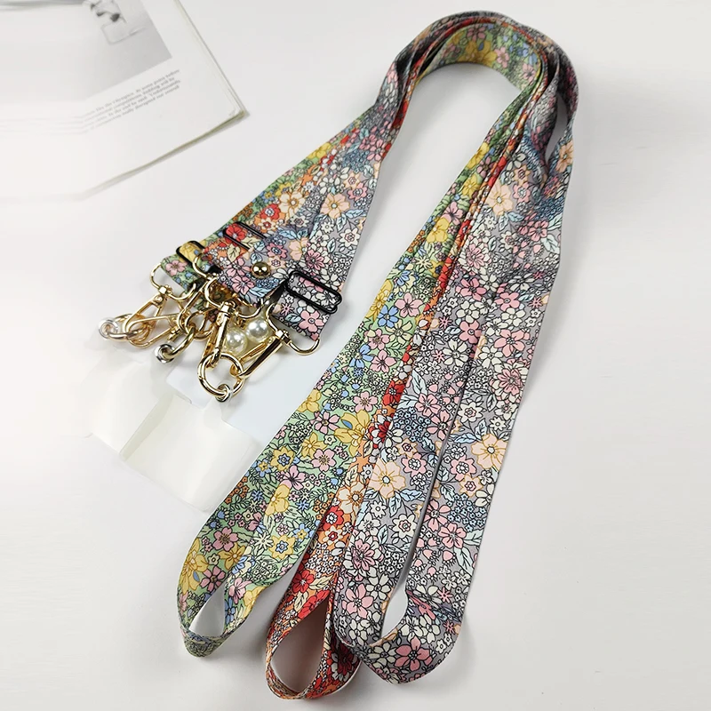 حزام حبل للهاتف الخلوي متقاطع مع الأزهار ، حبل معلق للرقبة قابل للتعديل مع مشبك حشية ، حبل حافظة عالمي مضاد للفقد