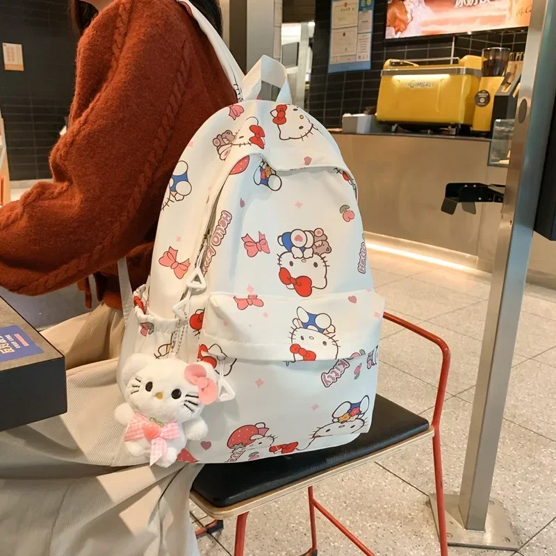 Sac d'école graffiti Hello Kitty pour filles, sac à main étudiant, vague de pinceau, étanche SR Sanurgente, polyvalent