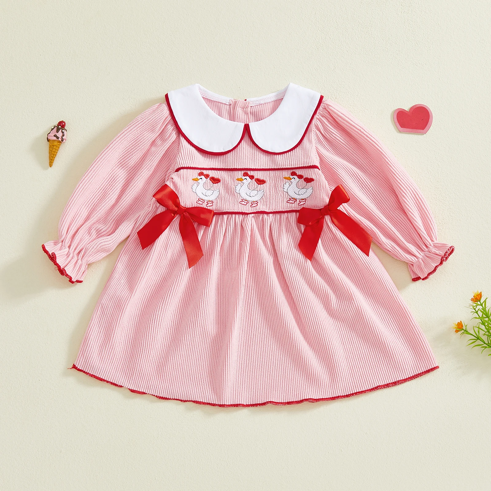 فستان بناتي لعيد الحب بأكمام منتفخة وياقة الدمية وتطريز على شكل فيونكة وتفاصيل على شكل حرف A وصورة ظلية مخططة