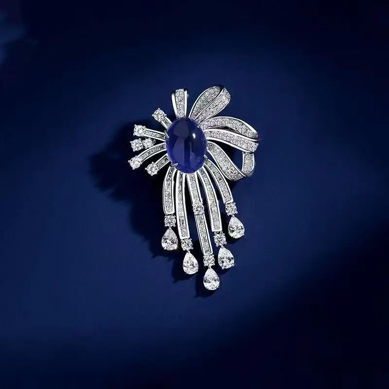 Broche con borla de cristal azul en forma de gota de agua Vintage de alta gama, Pin versátil a la moda para traje, abrigo, accesorio de Pin de flor en el pecho