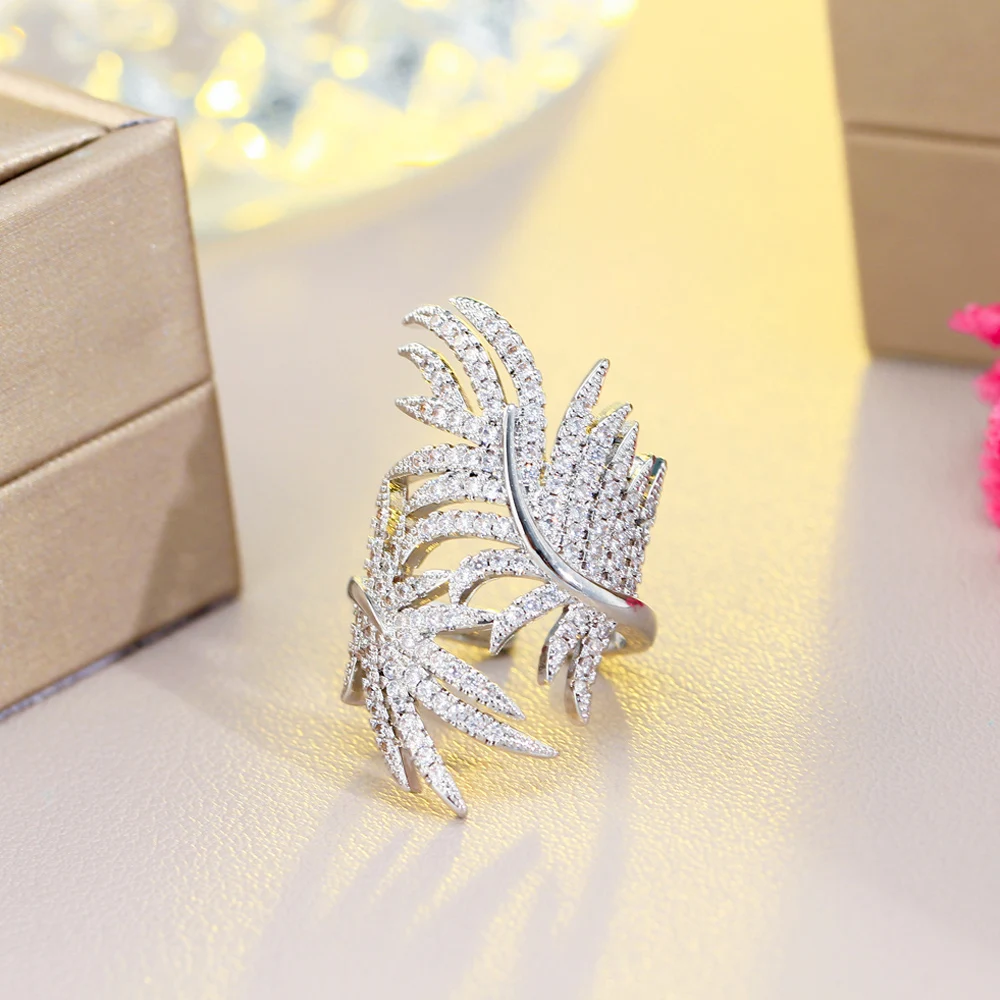 

ThreeGraces Sparkling Cubic Zirconia Feather Shape Big Bridal Wedding Open Ring for Women Adjustable Size Party Jewelry R190
