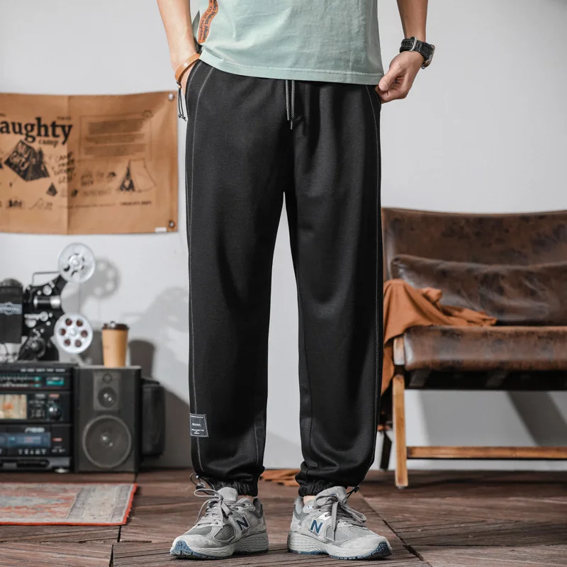 

2025 Summer Men's Trendy Fashion Thin Ice Silk Casual Versatile Simple Solid Color Waistband Loose Leg Tight Sports Pants
