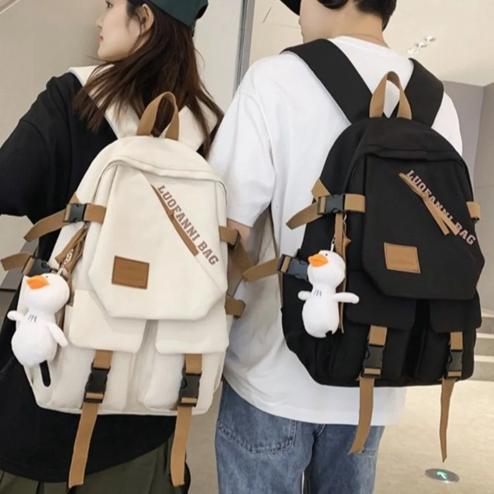 

Durable 15.6inch School Backpack With Pendants Large Capacity Laptop Backpack Lightweight Waterproof Shoulder Bag Students