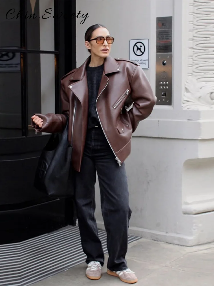 Chaqueta de cuero con cremalleras asimétricas para mujer, abrigo holgado con solapa lisa y bolsillos de manga larga, prendas de vestir elegantes para Otoño e Invierno 2025