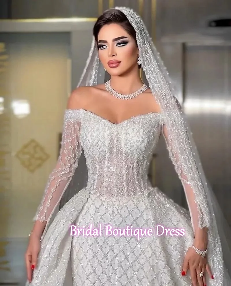 

Новинка: роскошное свадебное платье в ретро-стиле с жемчужной отделкой, силуэт «русалка», высококачественный съемный шлейф, прозрачные длинные рукава.