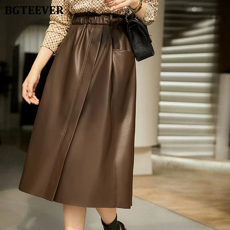 

BGTEEVER Stylish Elastic Waist Women PU Leather Skirts Spring Autumn Loose Pockets Faux Leather A-line Skirts Female