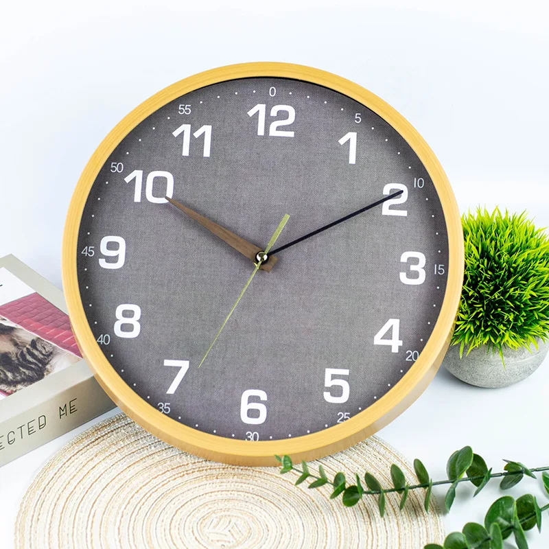 Modern simple imitation wood grain clock Small fresh wall clock Bedroom living room Fashion creative clock