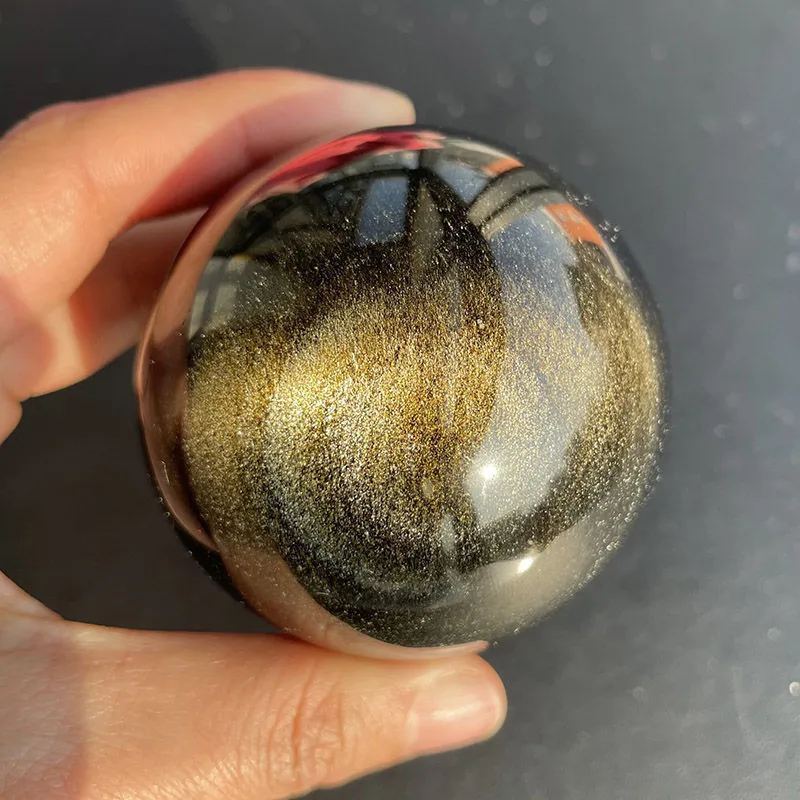

Красивая золотая сфера обсидиана, натуральный яркий блестящий кристалл, исцеление