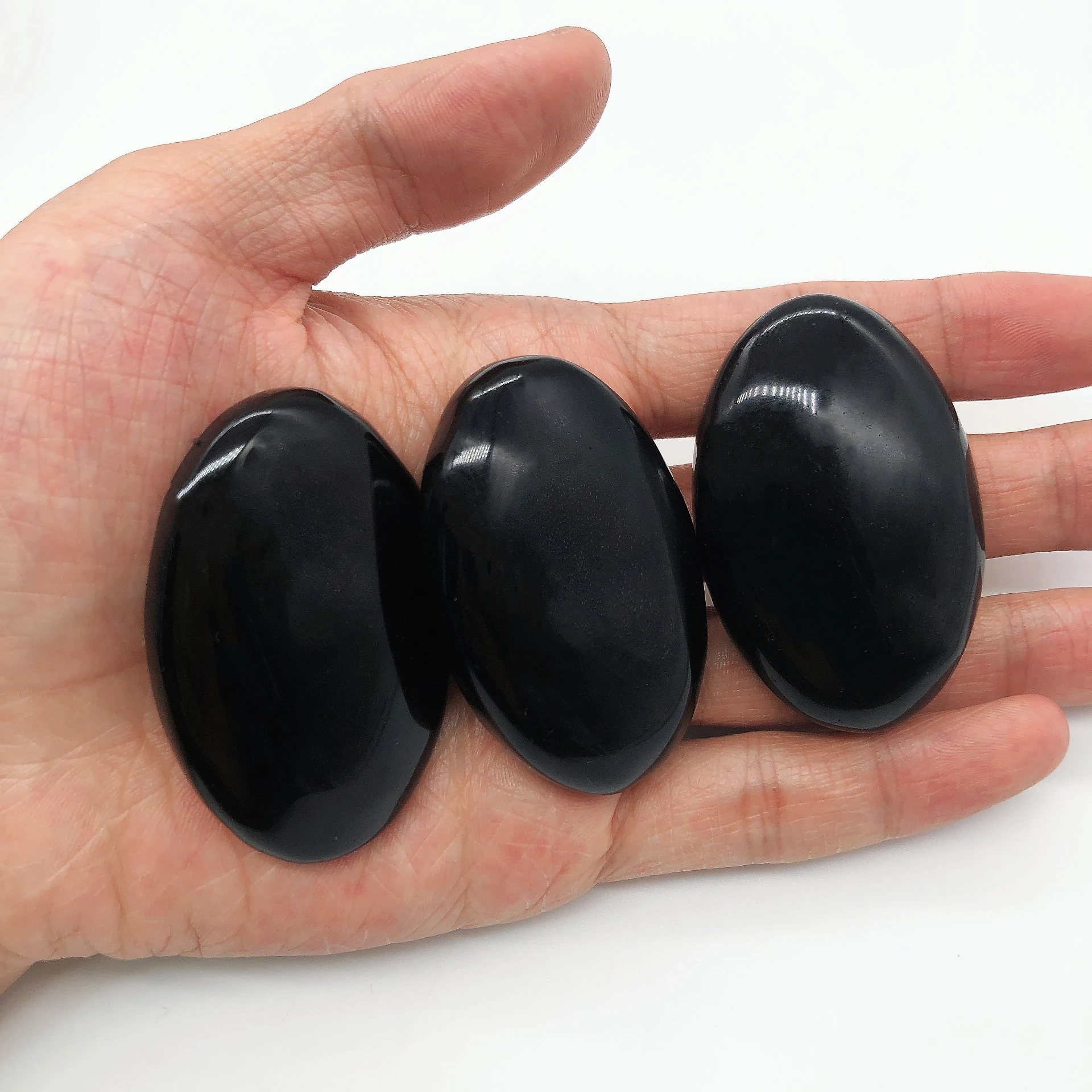 

﻿ 53MM Natural Black Obsidian Crystal Quartz Stone Tumbled Energy Reiki Hot Compress message tool Home Garden Decor gift