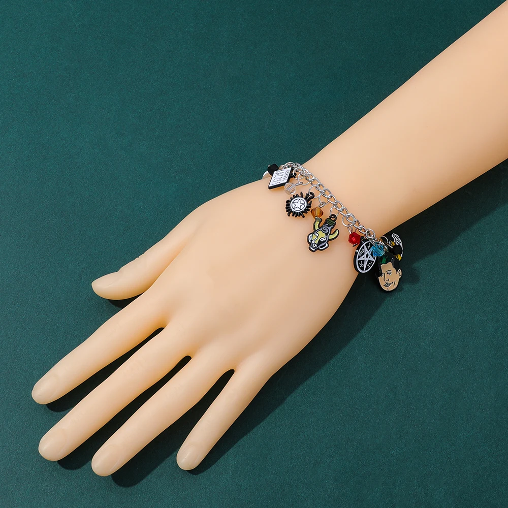 Supernatural TV Show Themed Charm Bracelet with Winchester Brothers Castiel Anti-Possession Symbol Impala And Colt Gun Charms - view 6