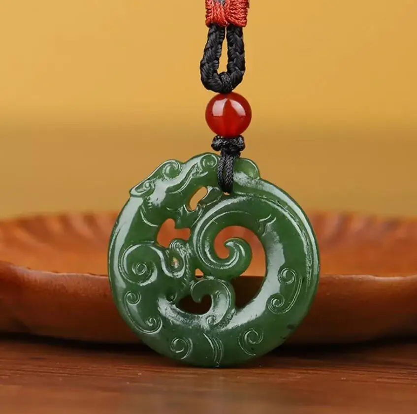 

Chinese Natural Grade A Green HeTian Jade jadeite Hand-Carved pendant Dragon