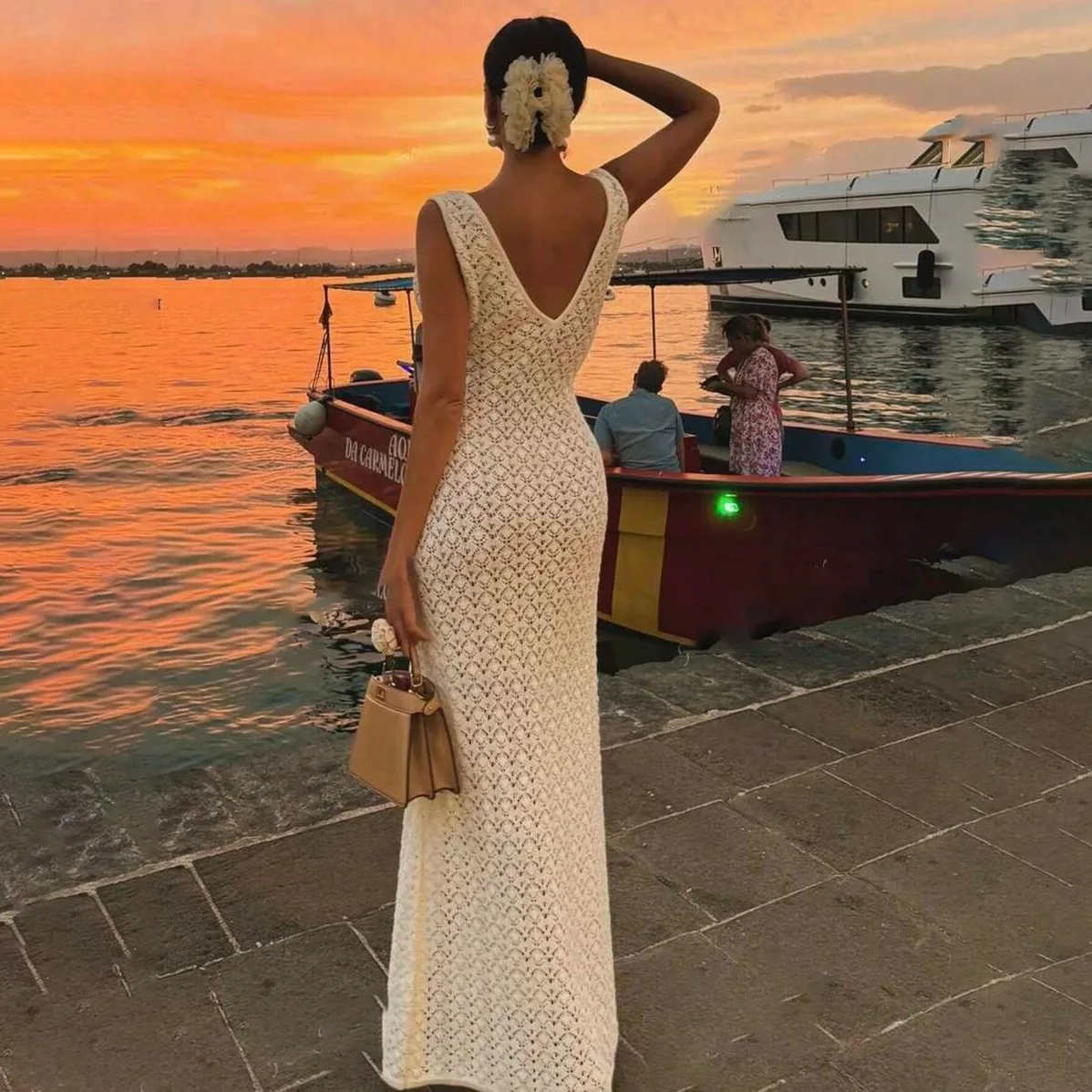 

2025 Summer European and American New Dresses Sexy Sleeveless Hollow Knitted Beach Dresses Backless High-end Women
