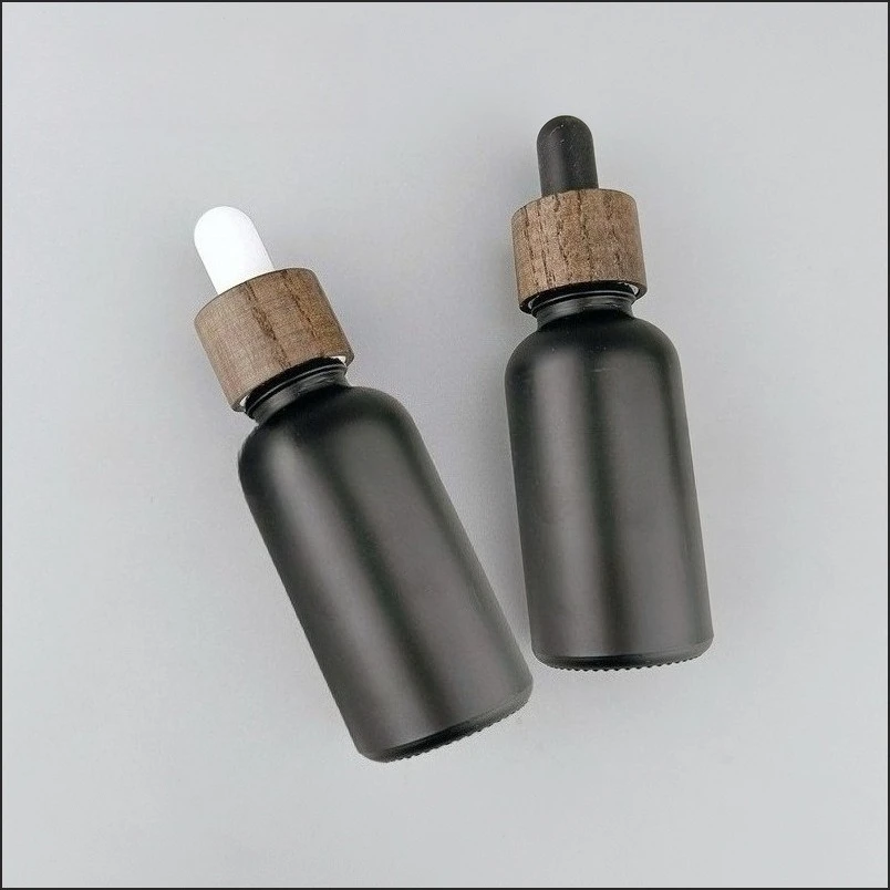 2/5/10pcs 5/10/15/20/30/50/100ml Matte Black Essential Oil Bottle Bamboo Wood Rubber Dropper Cap Frosted Glass Cosmetic Bottle view 2