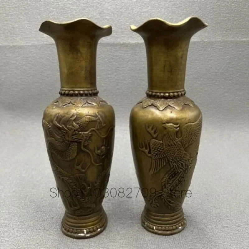 

Apair of hollow antique pure copper dragon and phoenix Chengxiang vase ornaments