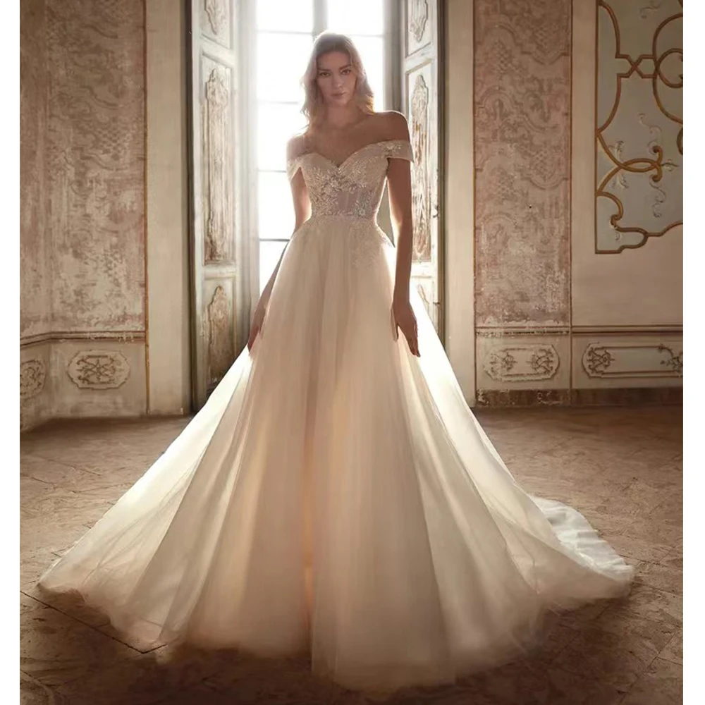 a-line flowy wedding dress sleeveless illution applique bridal gowns with v-back and slit