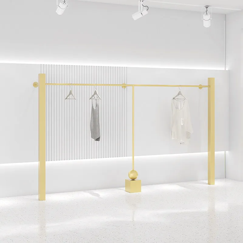 

Clothing store display rack against the wall hanging gold hanging clothes rack women's clothing store live broadcast special