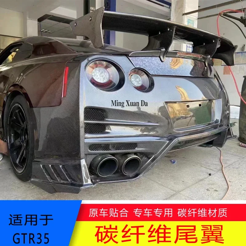 

Suitable for Ares 08-19 GTR R35 modified TOP carbon fiber rear spoiler fixed wind wing car