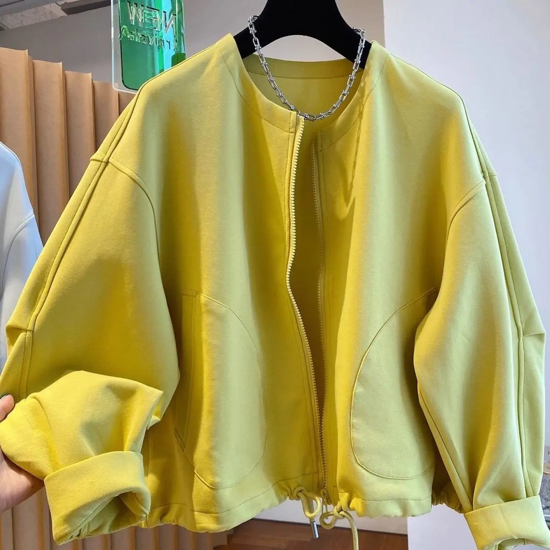 Yellow collarless women's autumn new high-end sense loose and lazy hem drawstring zipper sweater cardigan top jacket