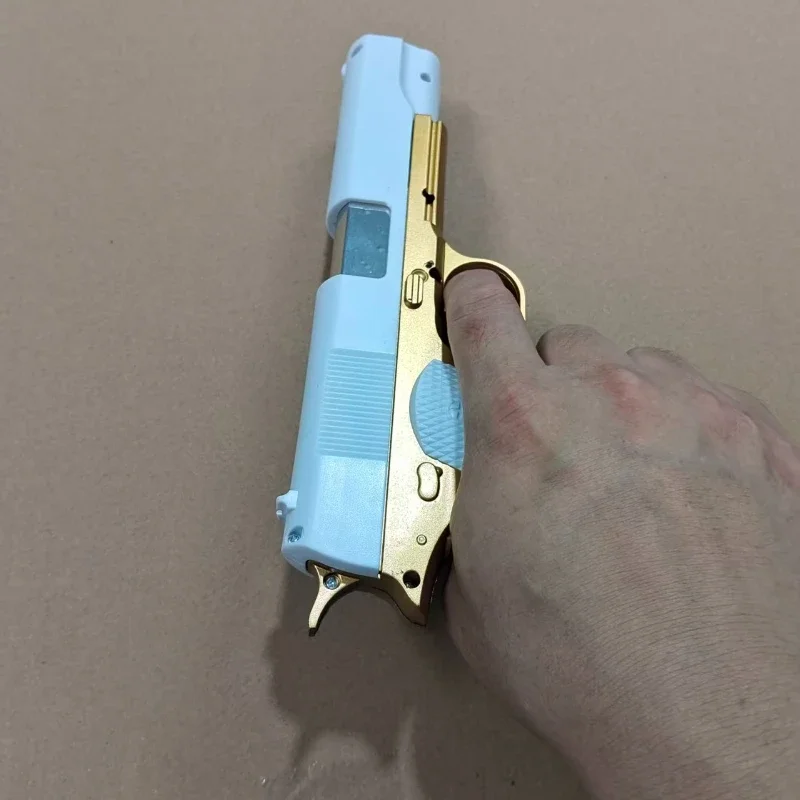 2026 Neu eingetroffen: Pop-Up-Spielzeugpistole mit weichen Kugeln, Gold-Weiß M1911 Kunststoffmodell, Outdoor-Spiel, Geschenk für Jungen und Kinder – Detail 6
