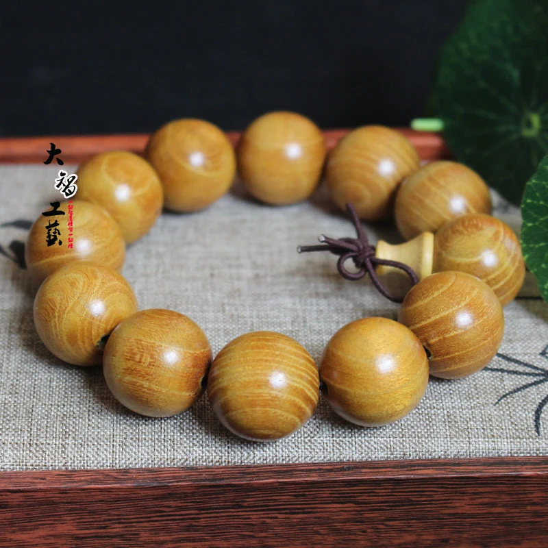 

Браслет из золотого сандалового дерева с бусинами Будды