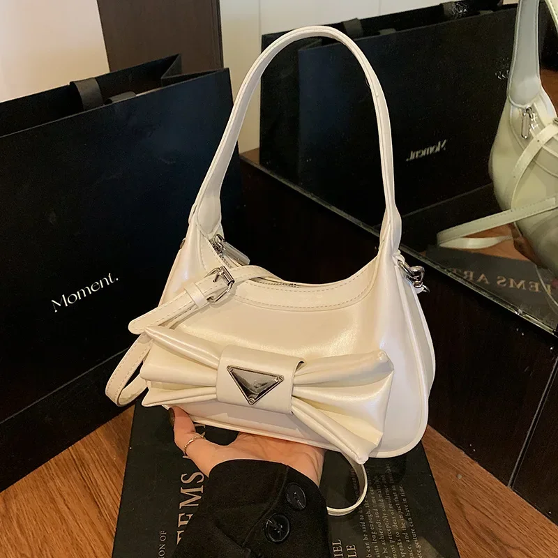 

2025 Summer New! Spice Girl-Inspired Underarm Bag - Exquisite Bowknot Dumpling Design | Trendy Niche High-End for Stylish Women