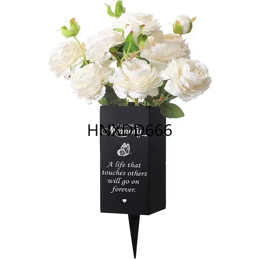 

Cemetery tomb metal funeral memorial flower stands with marked floral decorations for lawn courtyards