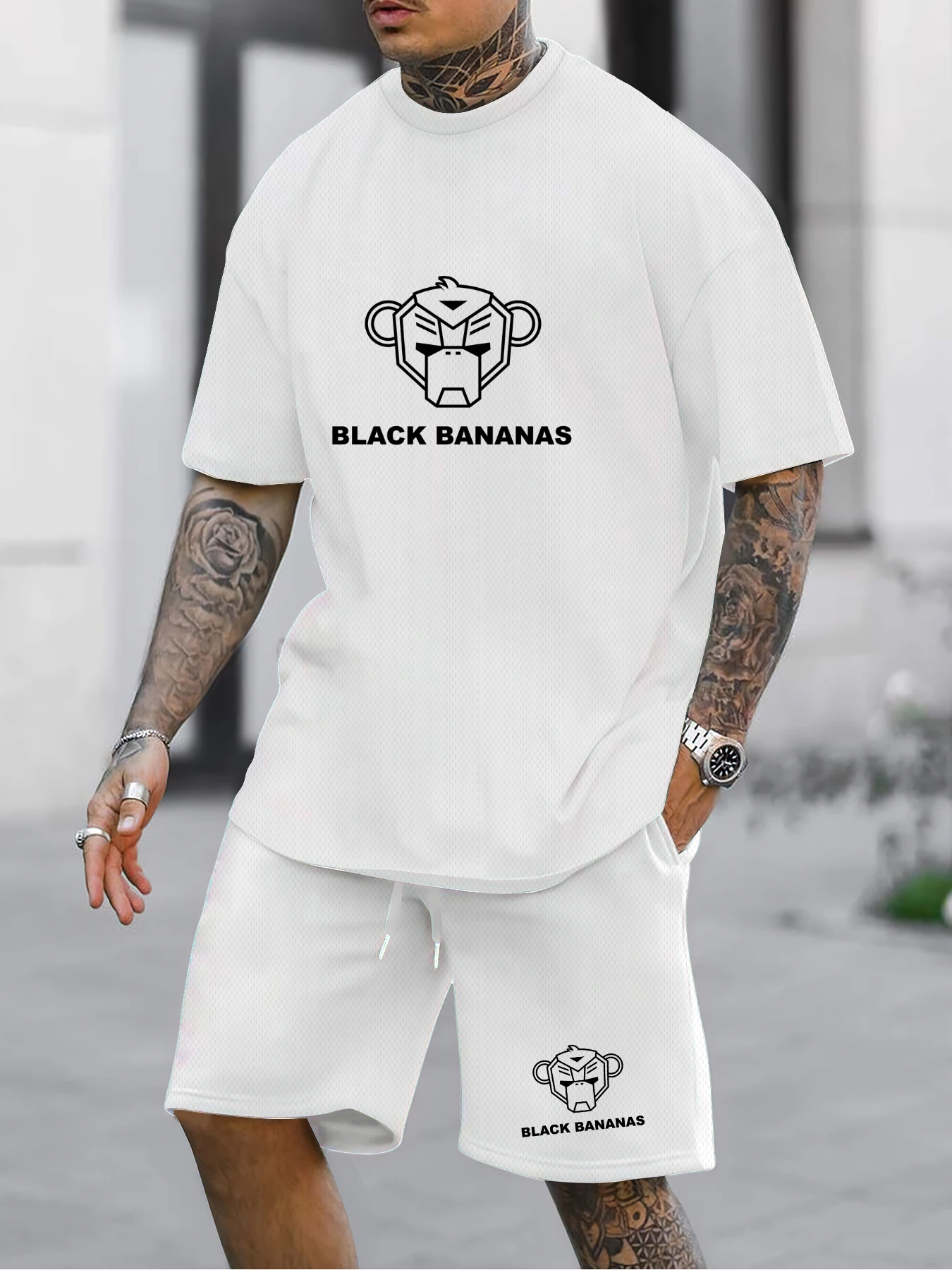 

Men's polyester BLACK BANANAS English sportswear, elegant and casual round-neck short-sleeved suit, slightly elastic knitted