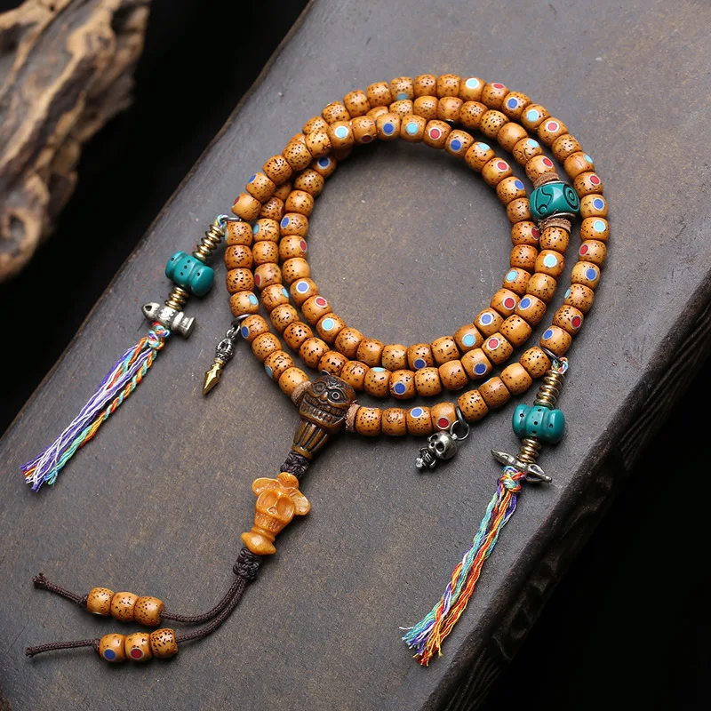 108-bead-string-of-antique-hainan-lao-xingyue-bodhi-beads-made-from-aged-raw-material-in-a-barrel-shaped-design