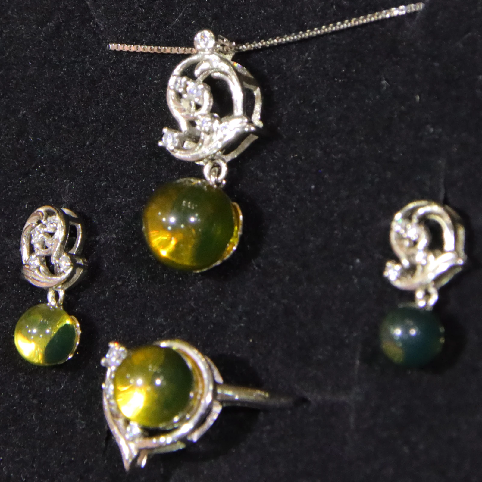 

Natural Blue Amber Trinity Set: Earrings 5mm/Pendant 7mm/Ring 8mm - A Romantic Handmade Luminous Gift For Your Loved One