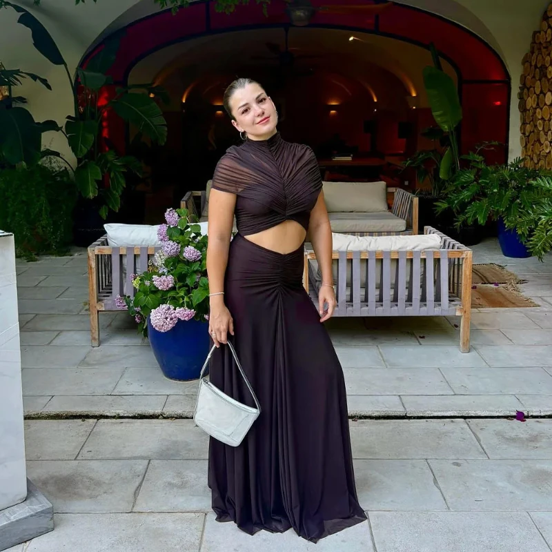 Europeo americano sexy moda estiva vita alta tinta unita maglia borsa pieghettata glutei ombelico esposto abito lungo abbigliamento da donna