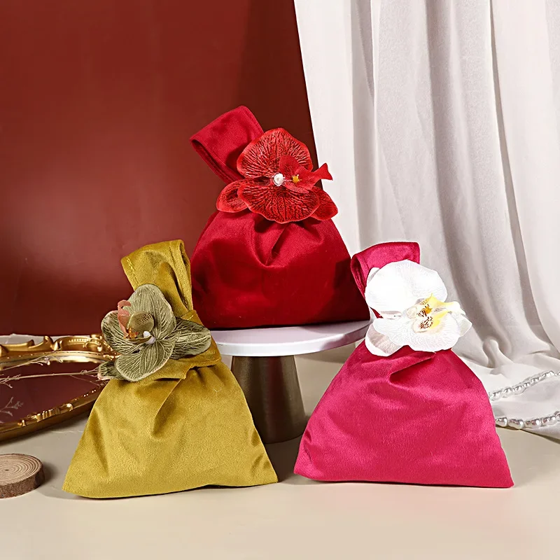 

10Pcs Phalaenopsis Handbag Wedding Candy Bag Velvet Gift Bags Sugar Box Souvenir Gift Return Candy Box Wedding Party Gift