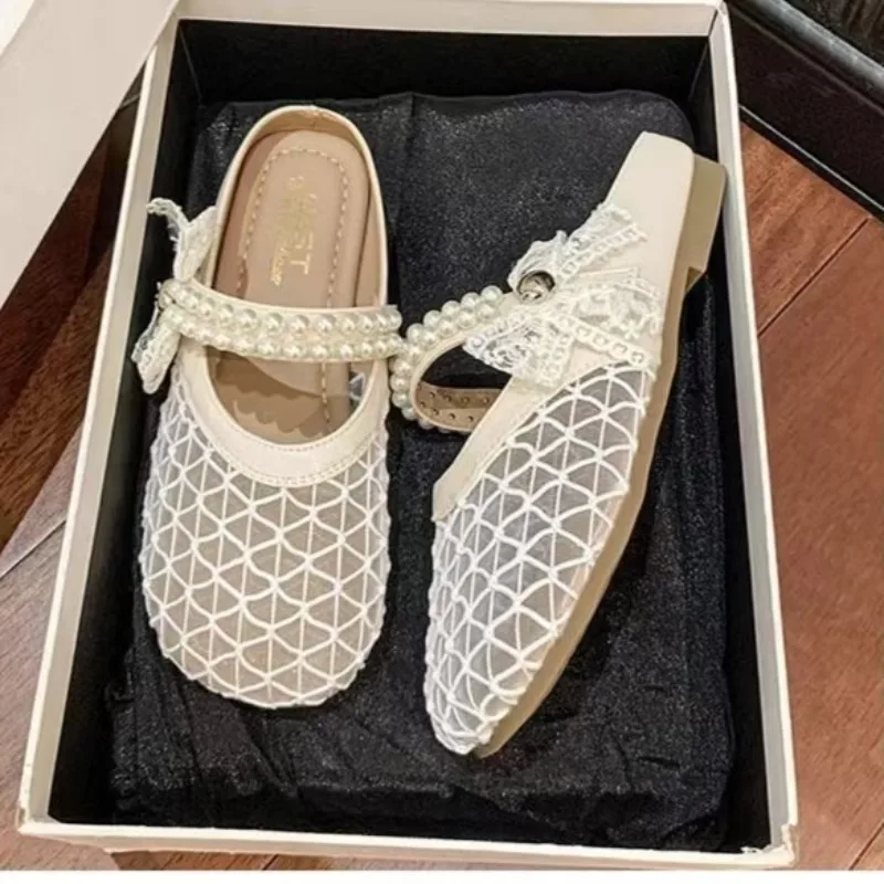 

Женские плетеные туфли на плоской подошве с полой сеткой, дышащие тапочки Baotou на плоской подошве, новые уличные крутые тапочки лета 2025 г.