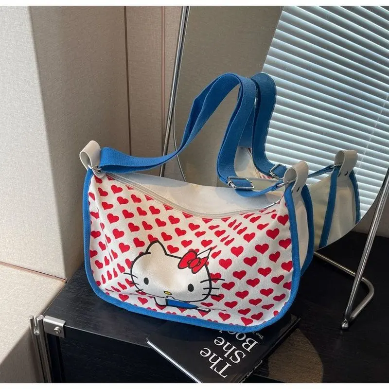 Sac en toile de grande capacité pour femmes et filles, sacs à bandoulière pour étudiants, ornements de boulettes, Anime Hello Kitty Stuff initié, nouveau, 2024