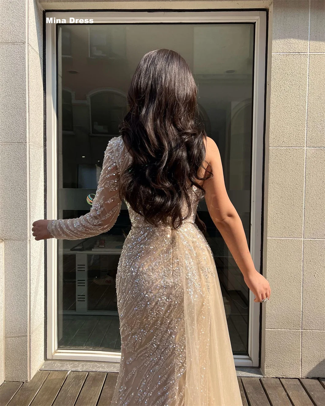Mina custom-made beaded gowns, perfect for special occasions, adorned with sequins. Long-sleeved evening gowns, luxurious and el