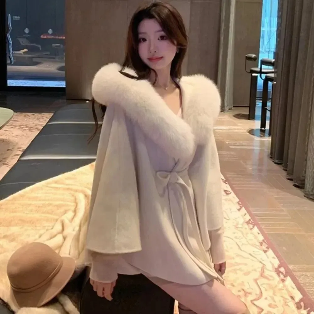 

Женское двустороннее кашемировое пальто, накидка 2024, осенне-зимняя шерстяная шуба средней длины с лисьим мехом, новая женская шерстяная куртка с капюшоном