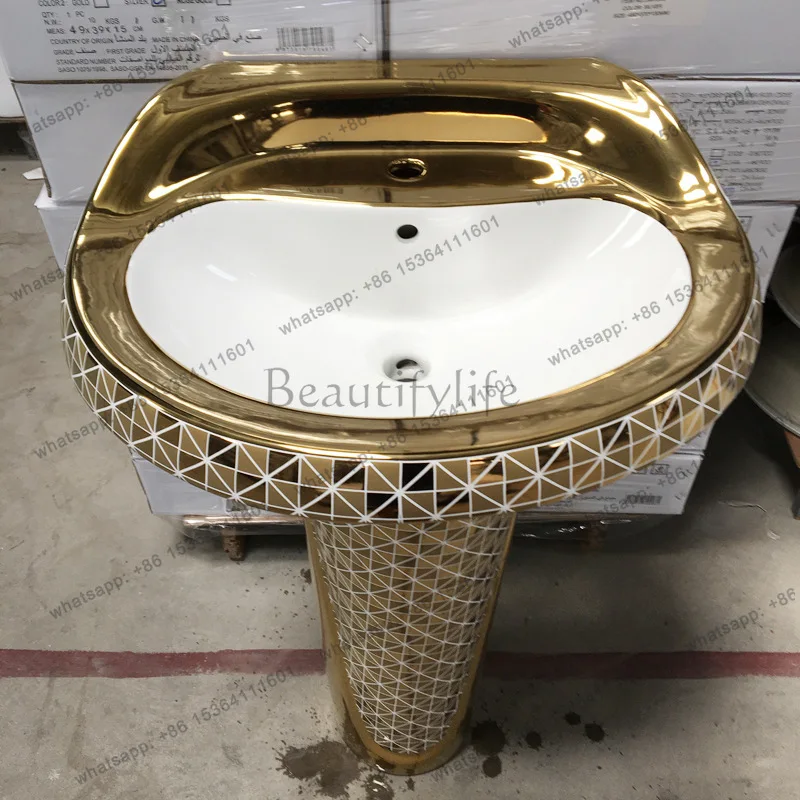 Gold split column basin electroplated gold square roughly vertical round basin