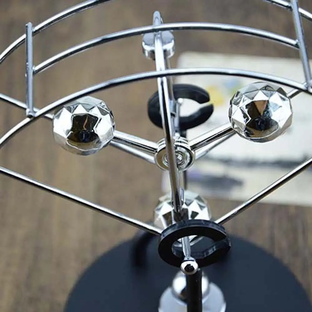 Motion Physical Pendulum Ball Figurine Rotating Perpetual Revolving Gadget Steel Balance Ball Home Decoration Modern Art