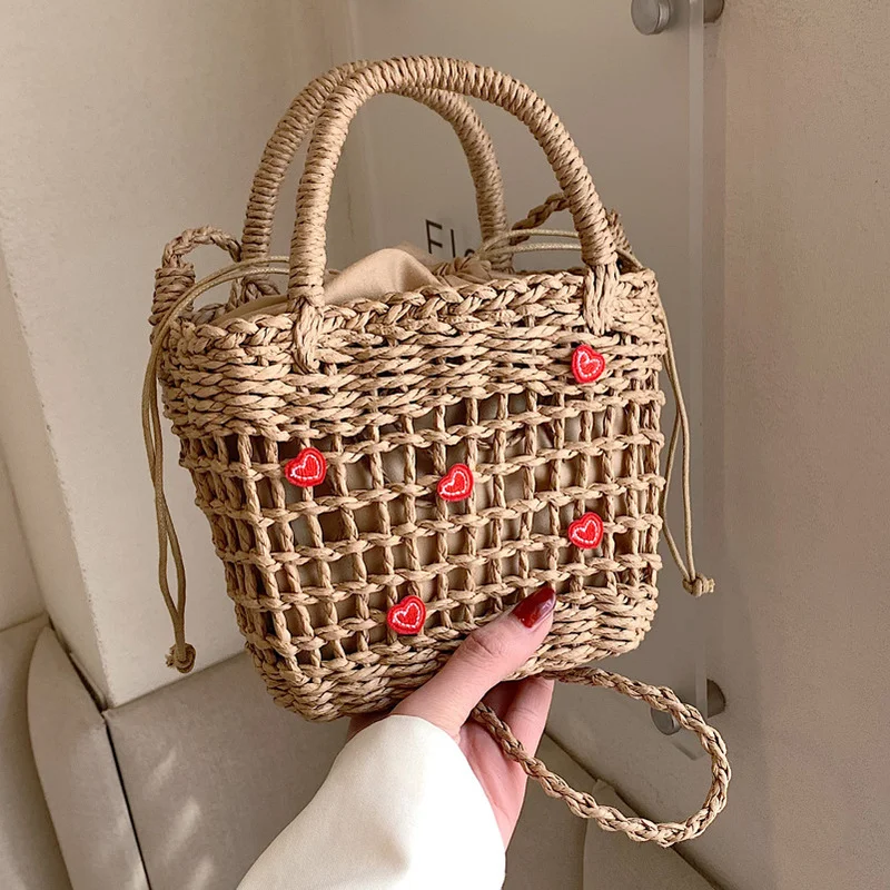 Borsa di paglia da spiaggia estiva bohémien borsa da donna tessuta a mano di moda borsa a secchiello femminile di design di alta qualità Shopper Love Money Bag