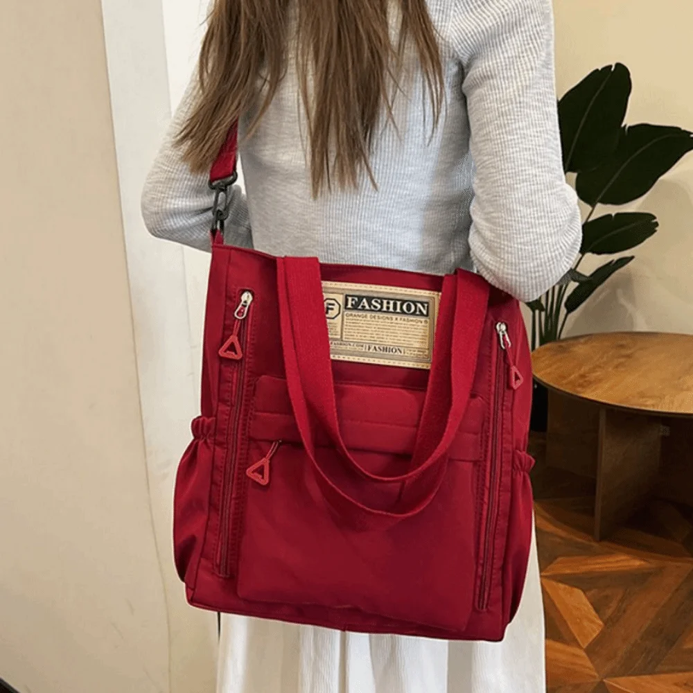 Effen kleur damesschoudertas Grote capaciteit Lichtgewicht studententas Draagbare eenvoudige schoudertas Werkreizen